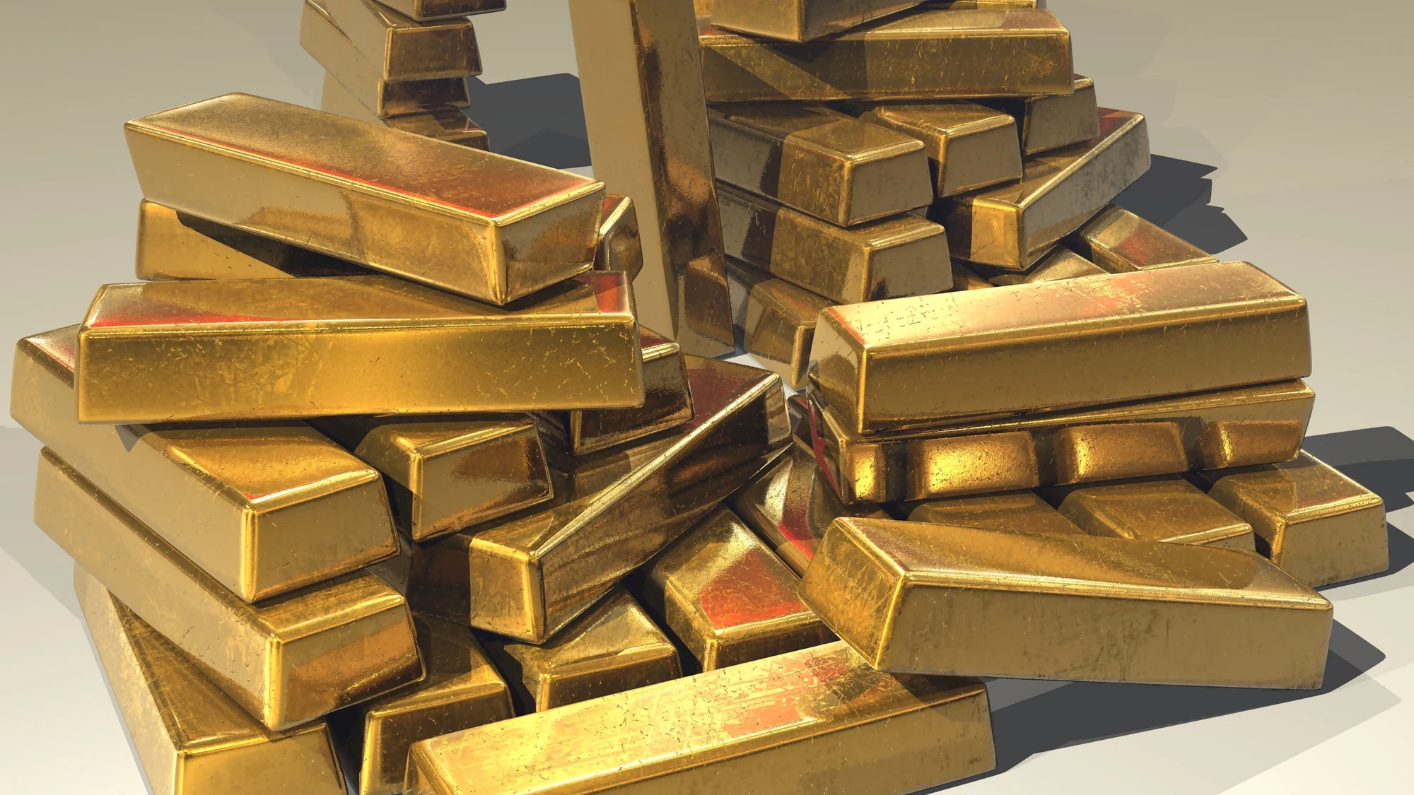 Gold bullion bars representing pure metal value baseline for jewelry pricing