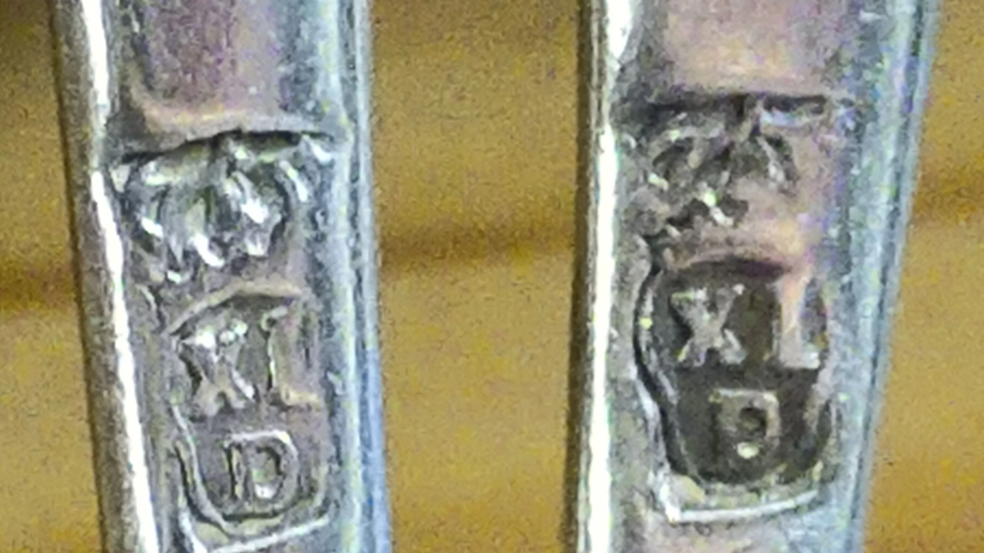 Hallmark reference plate used to identify metal marks and symbols
